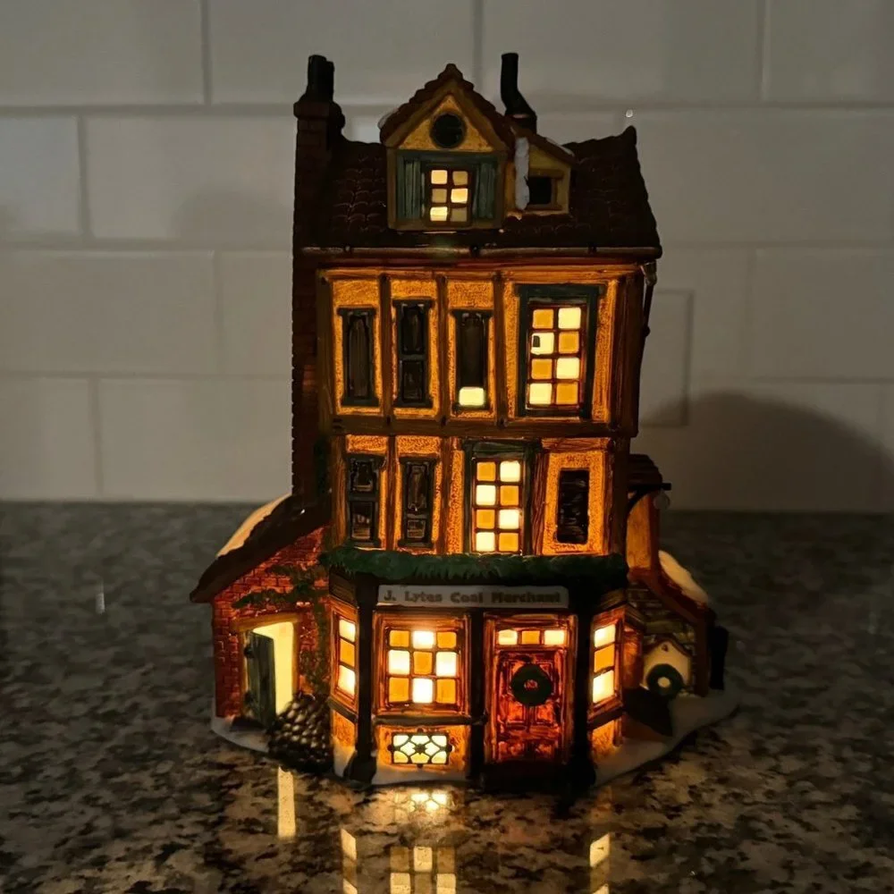 Dept 56 “J. Lytes Coal Merchant” Dickens Village Collection.